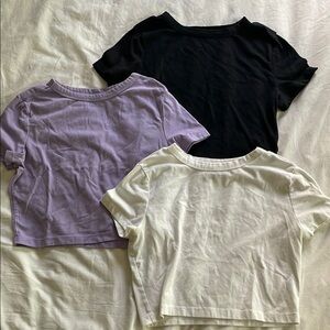 Set of Three T-Shirts in Black, Purple, and White
